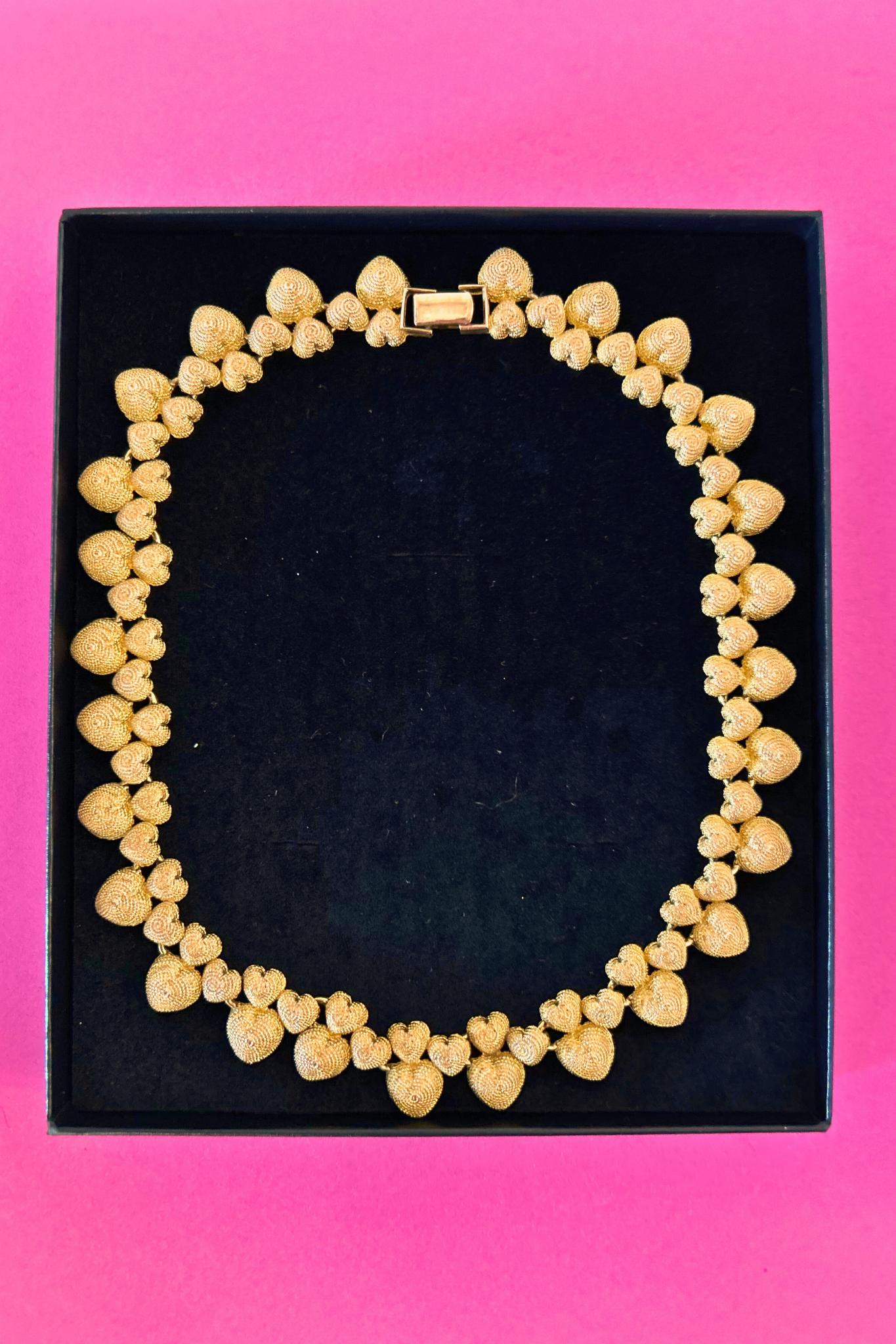 Collier doré coeurs