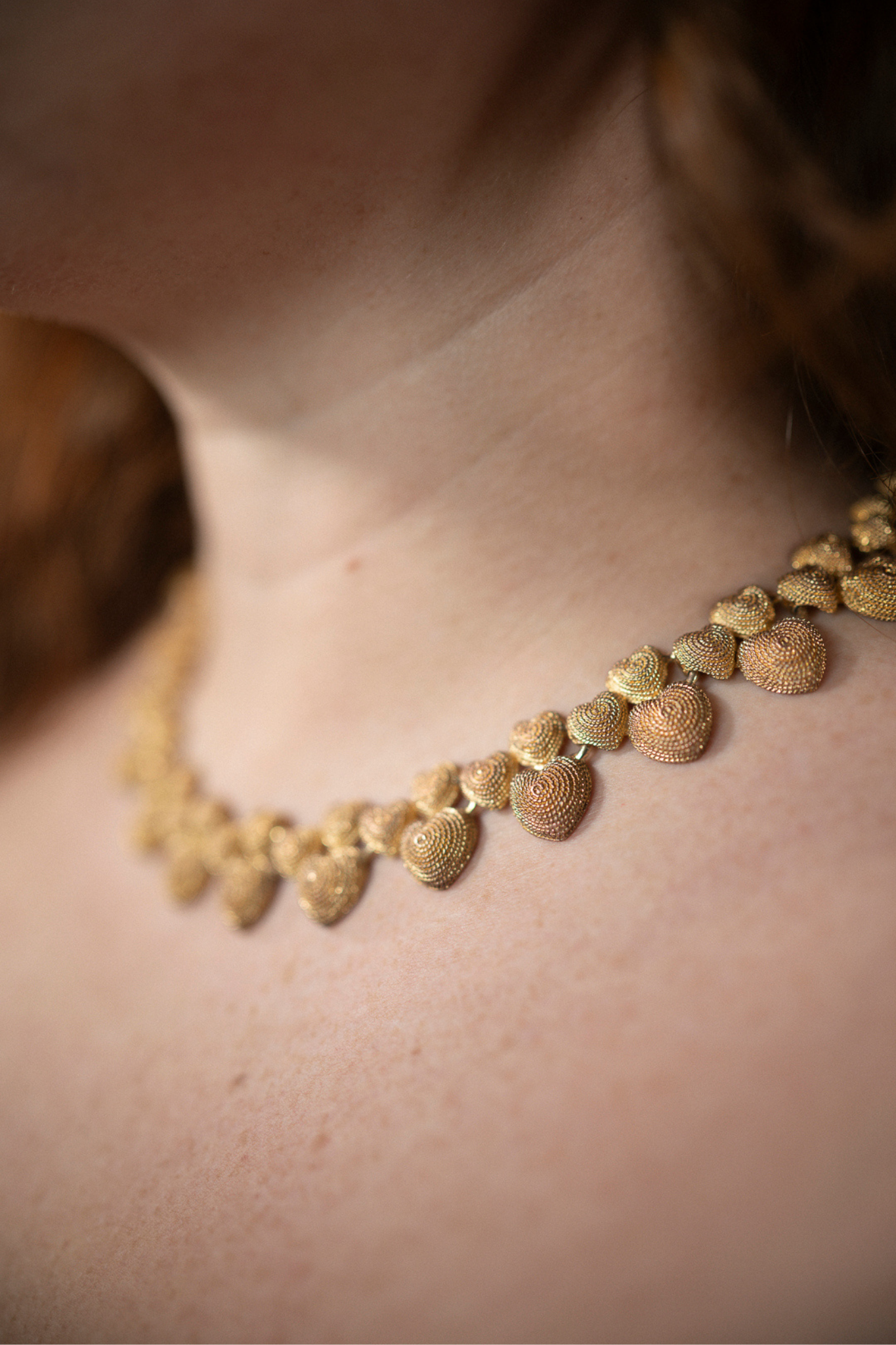 Collier doré coeurs